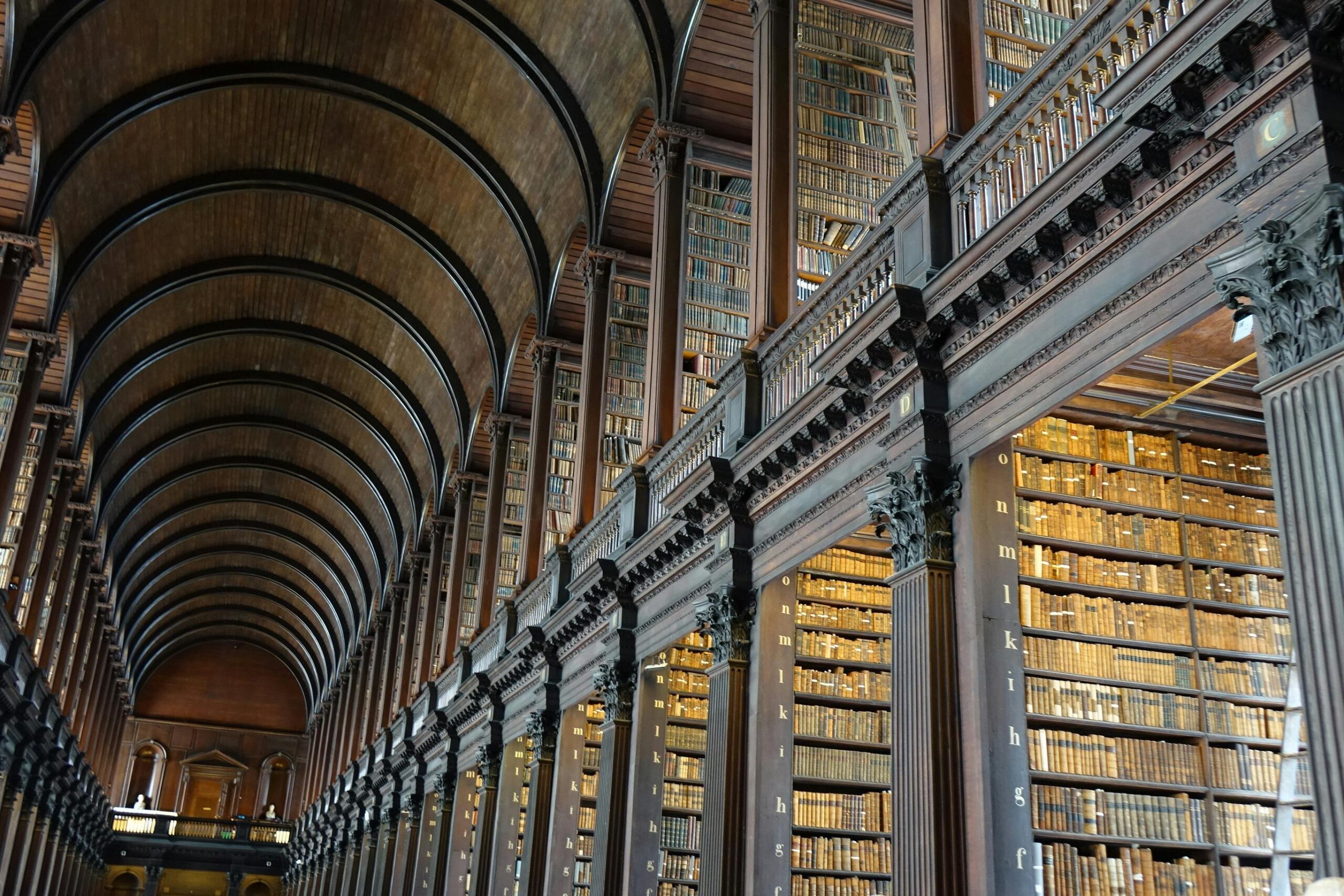 Expansive view of the historic Long Room library in Trinity College Dublin